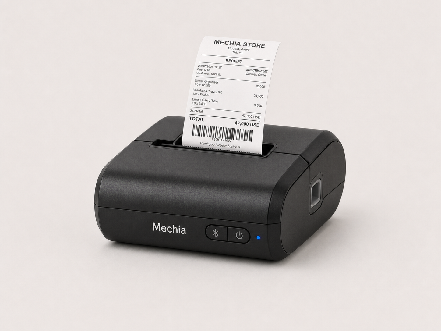 Mechia mobile Bluetooth printer printing a Mechia Store receipt